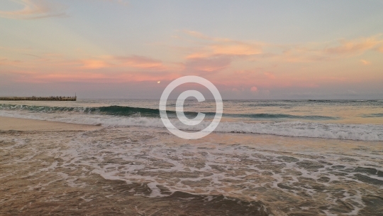 Beach Waves and the Moon
