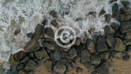 Beach Waves Crashing Over Rocks