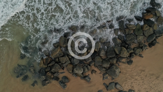 Beach Waves Crashing Over Rocks